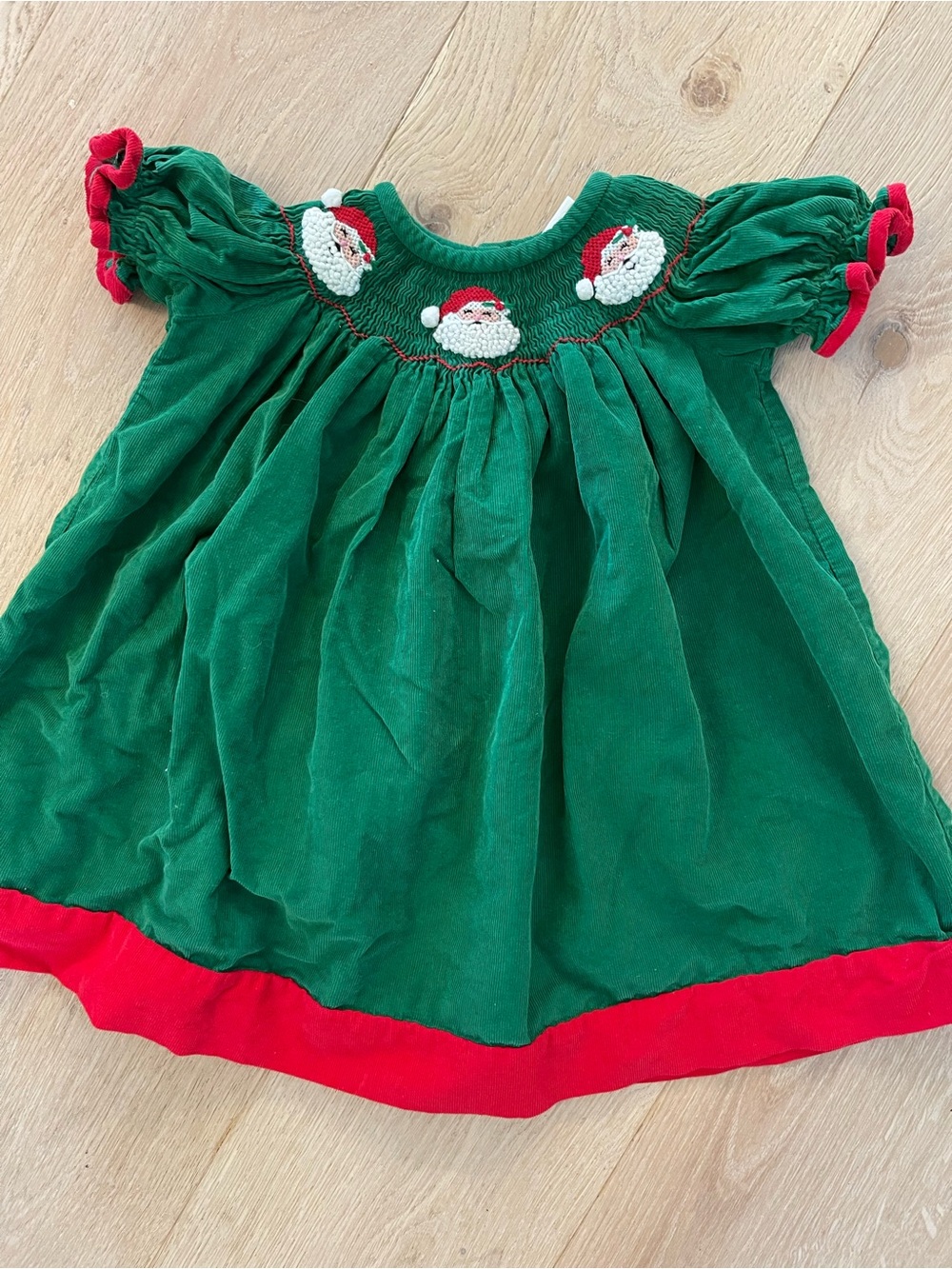 CLASSIC WHIMSY Santa smocked green corduroy dress with red trimming